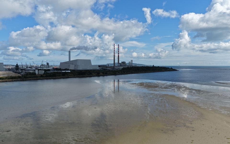 The Poolbeg chimneys seen from the air across Sandymount Strand